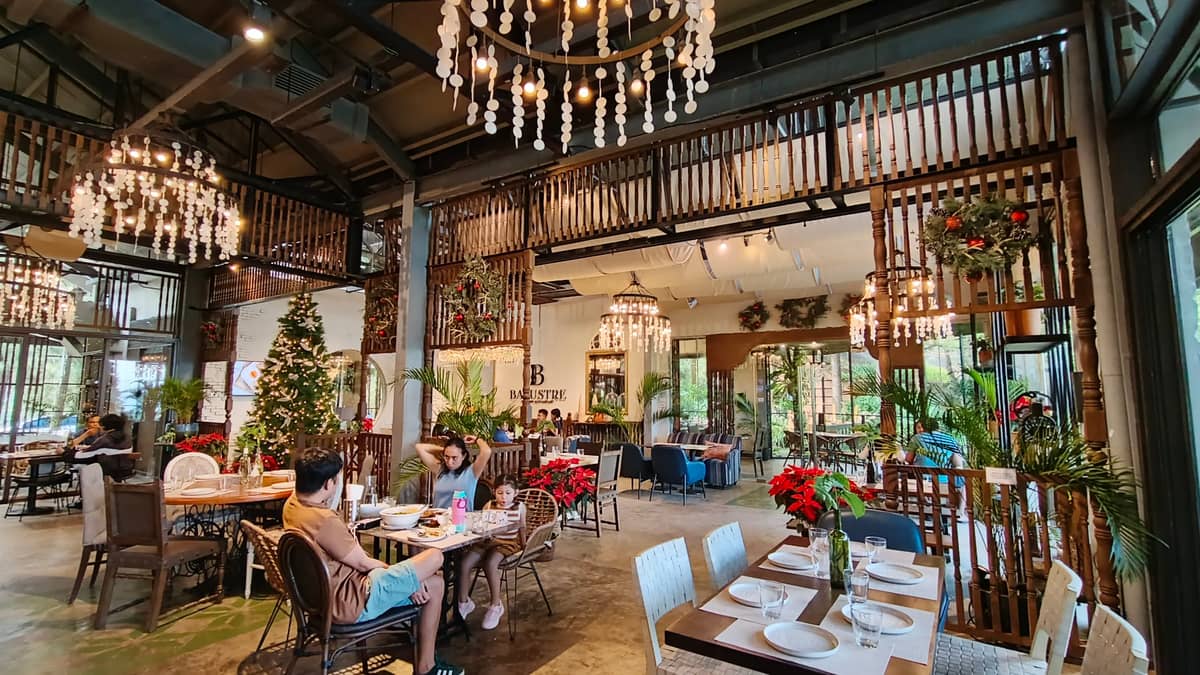 CHANDELIERS emit warm light, illuminating the place.