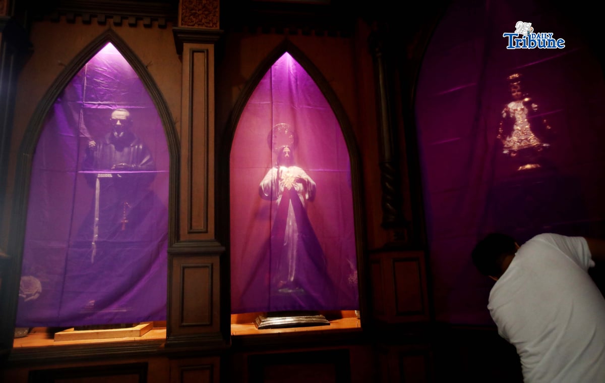 Personnel at Sto. Niño Parish Shrine in Brgy. Bago Bantay cover statues and sacred images in purple cloth, symbolizing both the sorrow of sin and the royal dignity of Christ. The veiling reflects Christ’s hiding during his Passion and prepares the faithful for the joy of Easter.