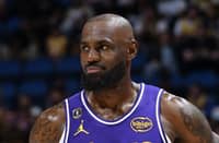 LeBron James #23 of the Los Angeles Lakers looks on as he plays a record 1,612th game of his career, breaking Hall of Famer Robert Parish for the all-time games-played mark on March 21, 2026 at Kia Center in Orlando, Florida.