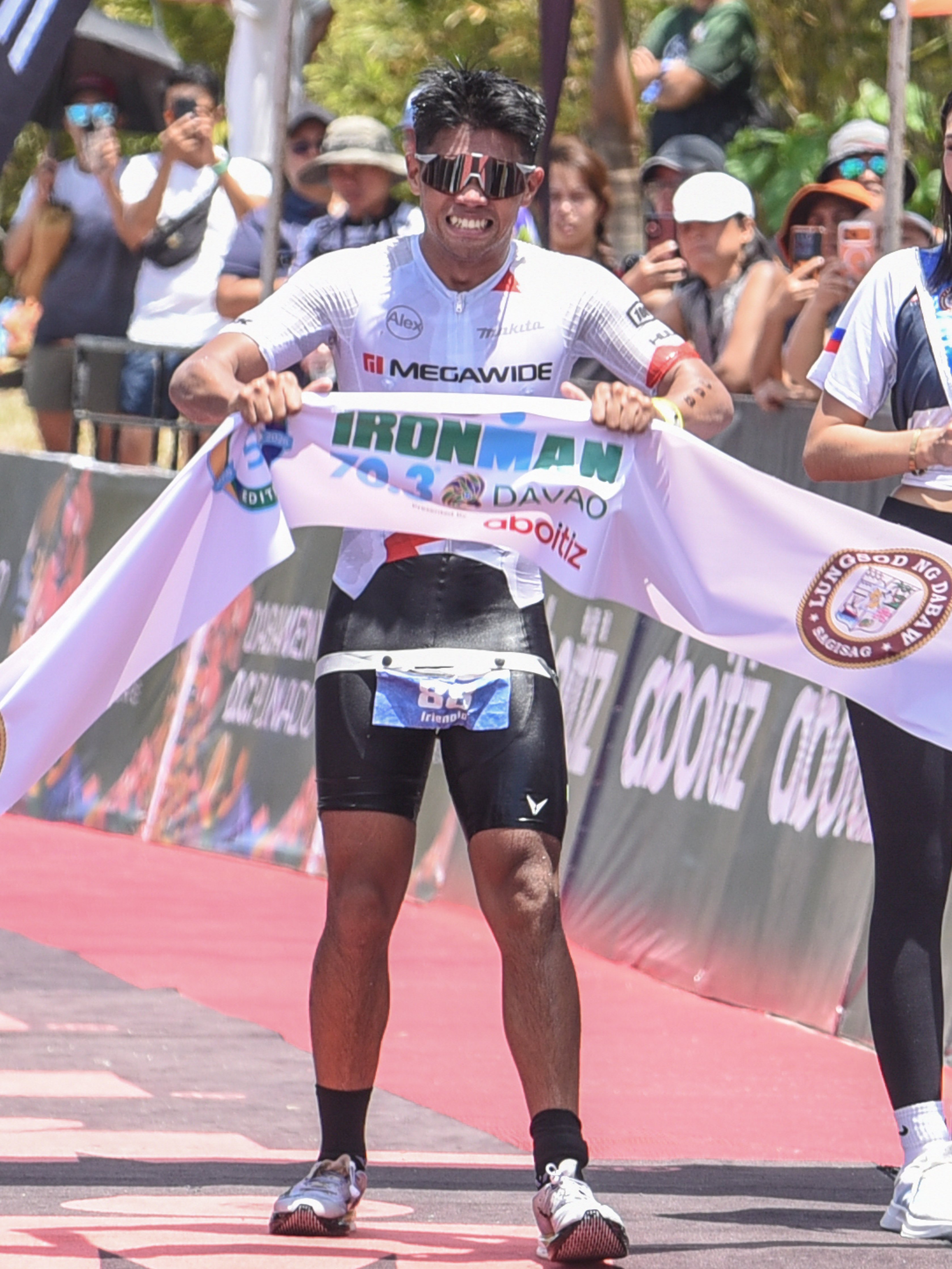 Reig conquers heat, field to rule IM 70.3 Davao