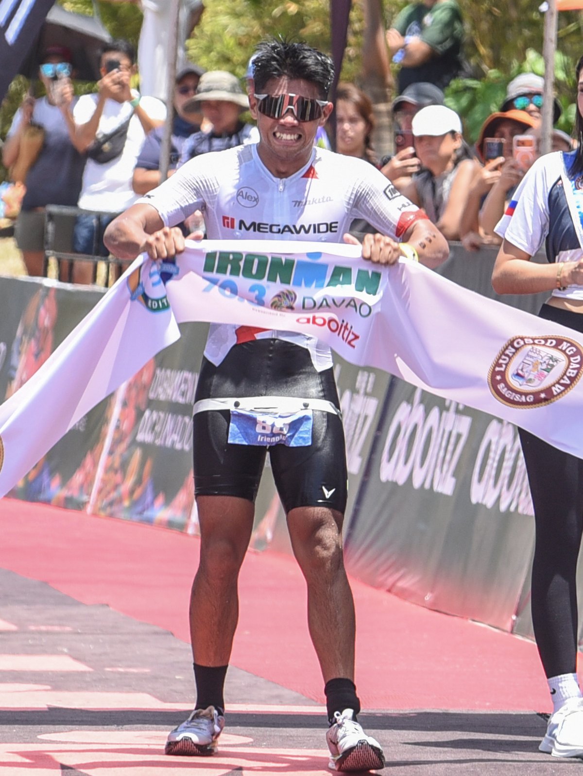 Reig conquers heat, field to rule IM 70.3 Davao