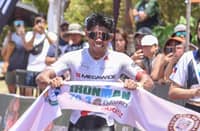 IRIENOLD Reig Jr. celebrates as he crosses the finish line to rule the BYD IRONMAN 70.3 Davao presented by Aboitiz at the Davao Coastal Road on Sunday.