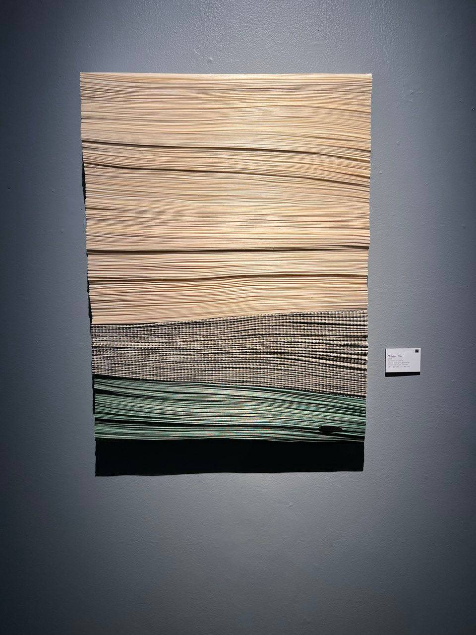 WHITE Sky, 2026, Handwoven raffia, abaca and spun polyester embroidered on canvas, 24” x 32.”