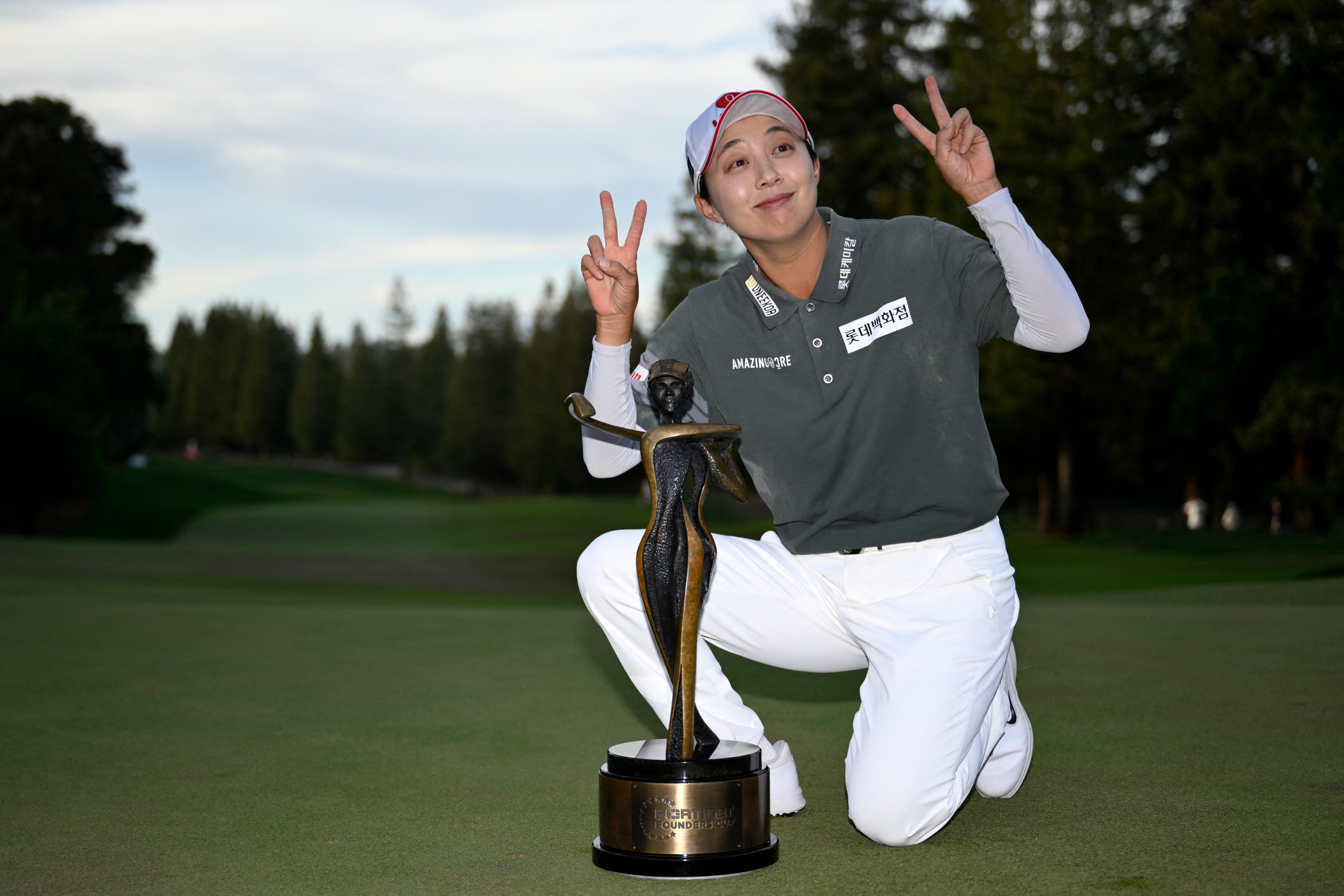 Kim hangs tough, rules Founders Cup