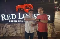 IBF minimumweight champion Pedro Taduran and trainer Carl Peñalosa take a brief break from training in Las Vegas.