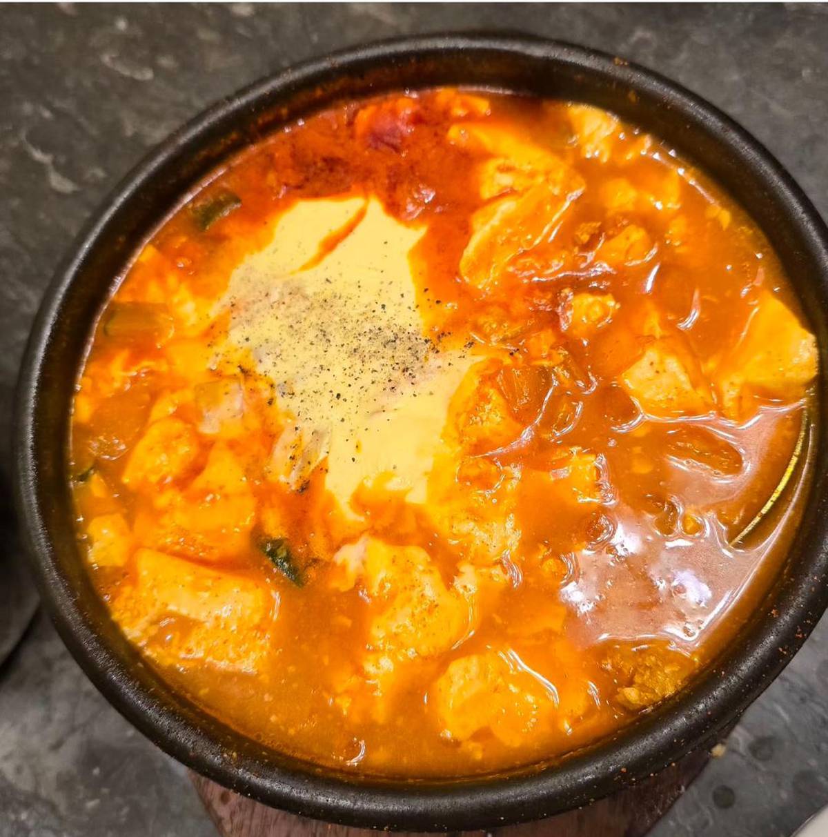 SOFT tofu soup with cheese.