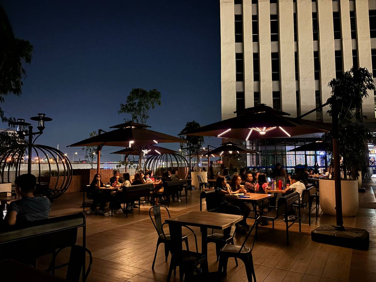SOLAR-powered parasols illuminate the Sky Garden at SM City Bicutan, providing sustainable nighttime lighting while enhancing the mall’s open-air dining experience.