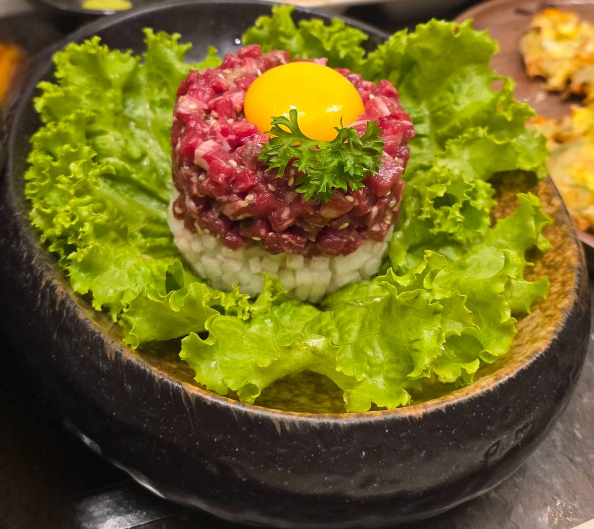 YOOK Hoe — seasoned fresh raw beef.