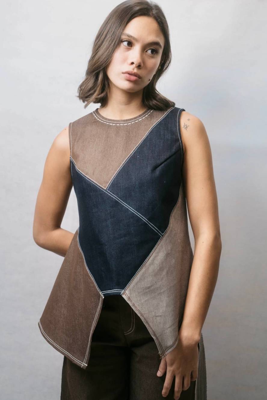 BREA Top is a patchwork of brown and dark denim. We use reverse sides to achieve different shades and has hand stitching on the neckline