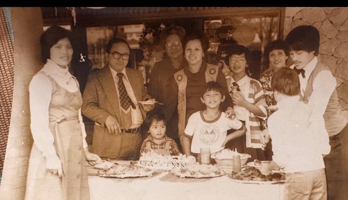 MY parents with three of the Cating children (my older sister, my brother, and the small girl in the middle is me.) This was probably taken in 1980.