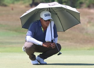 Quiban clings to 2-shot lead