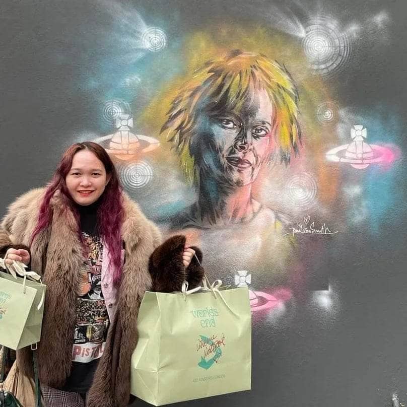 THE author with a graffiti of ‘The Grand Dame of Fashion’ Vivienne Westwood.
