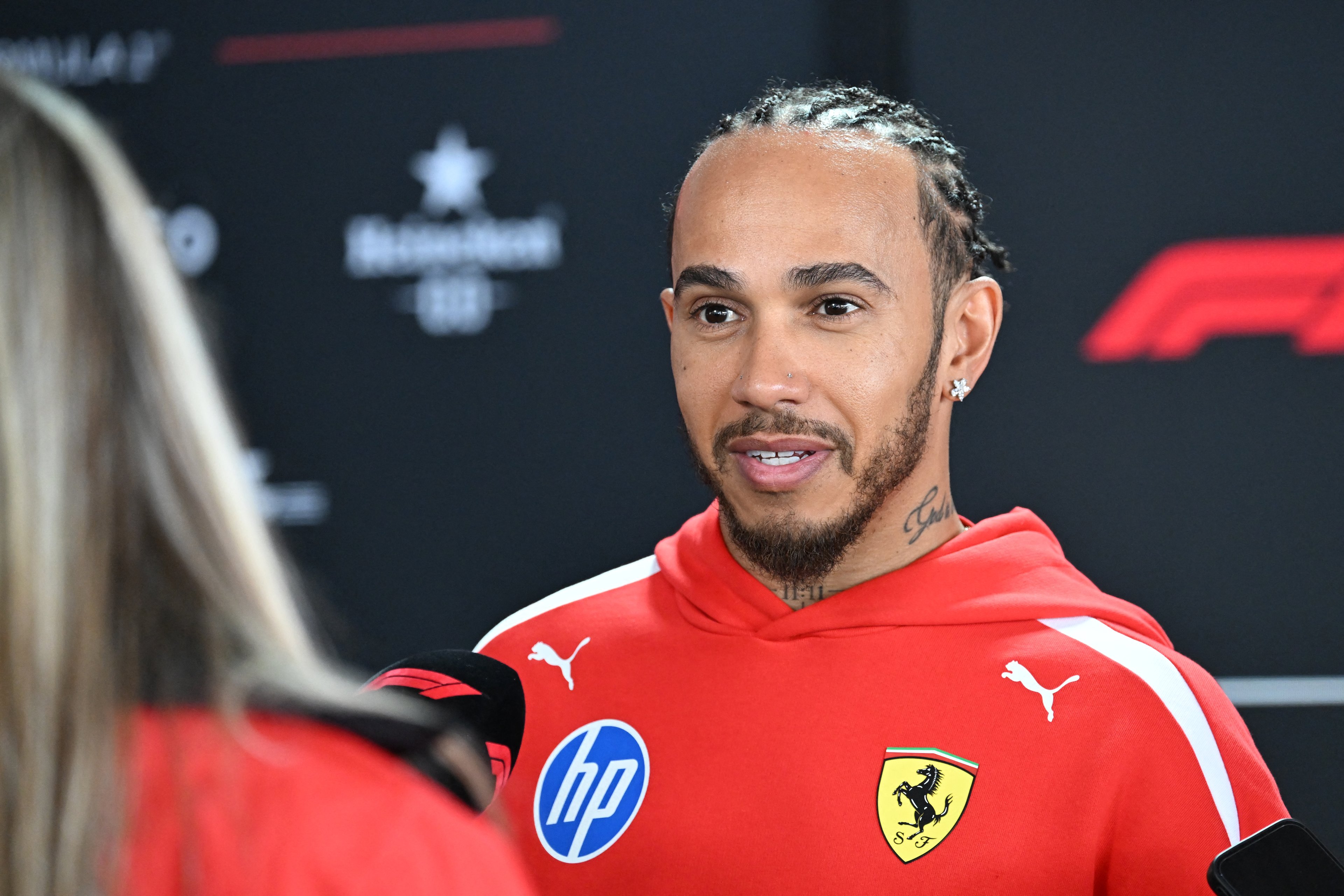 HAMILTON speaks to the media in Suzuka as he doubles down on his commitment to Formula One with Ferrari.
