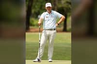 RICO Hoey surveys the sixth green during the opening round of the Texas Children’s Houston Open at Memorial Park Golf Course on Friday.