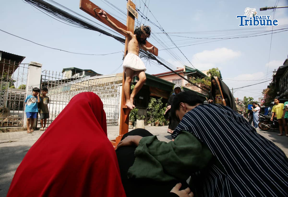 (March 28 2026) The Diocesan Shrine and Parish of Our Lady of Light, youth members take part in the Living Stations of the Cross in Barangay San Juan in Cainta on Saturday, March 28, 2026. The annual Lenten tradition, led by the parish youth ministry, brings the community together as they reenact Christ’s passion while moving through selected barangays. Cainta, Rizal, is recognized as the "Senakulo Capital of the Philippines" for its deep-rooted Holy Week tradition of performing theatrical re-enactments of the passion, death, and resurrection of Jesus Christ. Since 1904, the town has staged elaborate Passion plays involving multiple local groups. Photo/Analy Labor