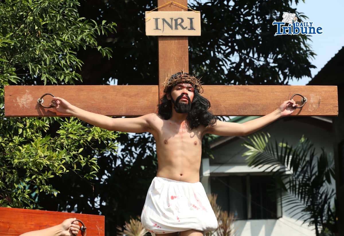 (March 28 2026) The Diocesan Shrine and Parish of Our Lady of Light, youth members take part in the Living Stations of the Cross in Barangay San Juan in Cainta on Saturday, March 28, 2026. The annual Lenten tradition, led by the parish youth ministry, brings the community together as they reenact Christ’s passion while moving through selected barangays. Cainta, Rizal, is recognized as the "Senakulo Capital of the Philippines" for its deep-rooted Holy Week tradition of performing theatrical re-enactments of the passion, death, and resurrection of Jesus Christ. Since 1904, the town has staged elaborate Passion plays involving multiple local groups. Photo/Analy Labor