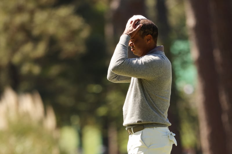 Tiger Woods pleads guilty to reckless driving, license suspended