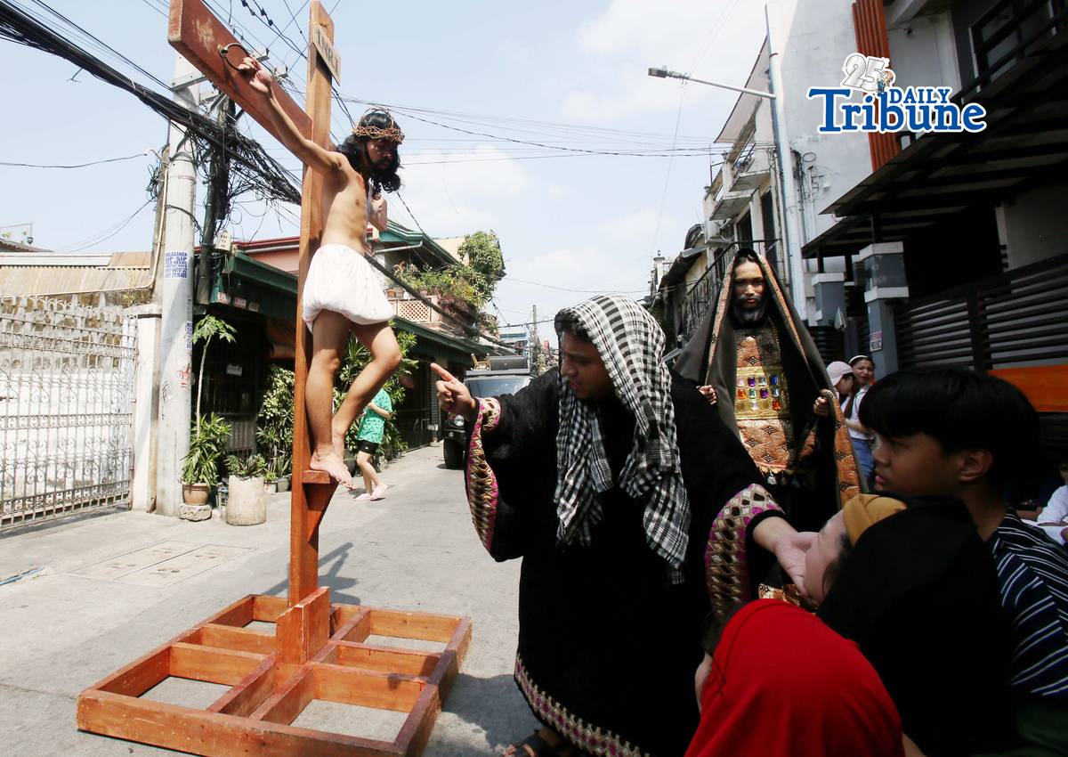 (March 28 2026) The Diocesan Shrine and Parish of Our Lady of Light, youth members take part in the Living Stations of the Cross in Barangay San Juan in Cainta on Saturday, March 28, 2026. The annual Lenten tradition, led by the parish youth ministry, brings the community together as they reenact Christ’s passion while moving through selected barangays. Cainta, Rizal, is recognized as the "Senakulo Capital of the Philippines" for its deep-rooted Holy Week tradition of performing theatrical re-enactments of the passion, death, and resurrection of Jesus Christ. Since 1904, the town has staged elaborate Passion plays involving multiple local groups. Photo/Analy Labor