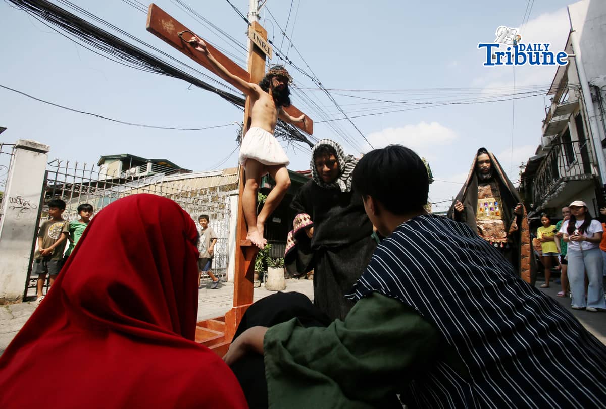 (March 28 2026) The Diocesan Shrine and Parish of Our Lady of Light, youth members take part in the Living Stations of the Cross in Barangay San Juan in Cainta on Saturday, March 28, 2026. The annual Lenten tradition, led by the parish youth ministry, brings the community together as they reenact Christ’s passion while moving through selected barangays. Cainta, Rizal, is recognized as the "Senakulo Capital of the Philippines" for its deep-rooted Holy Week tradition of performing theatrical re-enactments of the passion, death, and resurrection of Jesus Christ. Since 1904, the town has staged elaborate Passion plays involving multiple local groups. Photo/Analy Labor