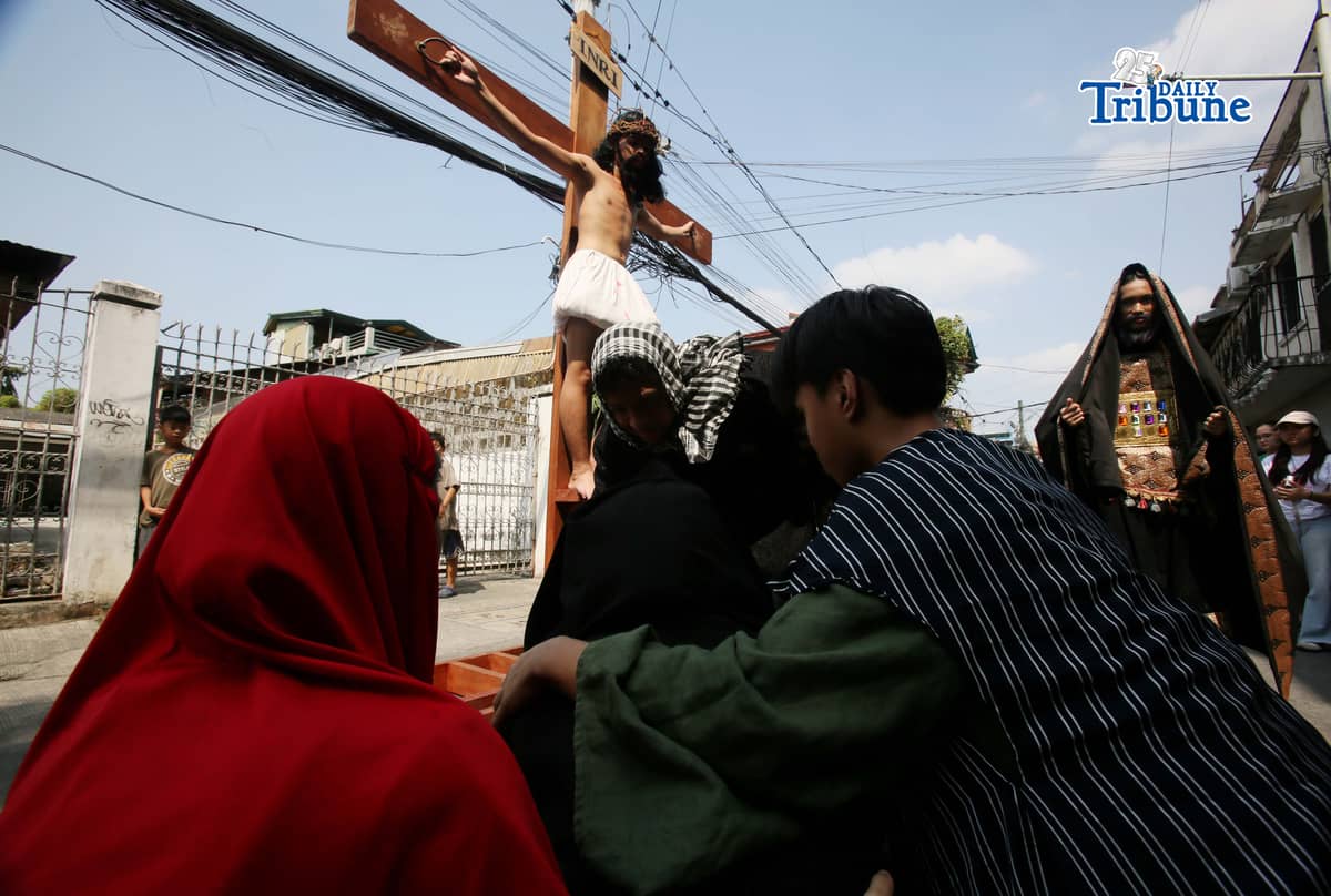 (March 28 2026) The Diocesan Shrine and Parish of Our Lady of Light, youth members take part in the Living Stations of the Cross in Barangay San Juan in Cainta on Saturday, March 28, 2026. The annual Lenten tradition, led by the parish youth ministry, brings the community together as they reenact Christ’s passion while moving through selected barangays. Cainta, Rizal, is recognized as the "Senakulo Capital of the Philippines" for its deep-rooted Holy Week tradition of performing theatrical re-enactments of the passion, death, and resurrection of Jesus Christ. Since 1904, the town has staged elaborate Passion plays involving multiple local groups. Photo/Analy Labor