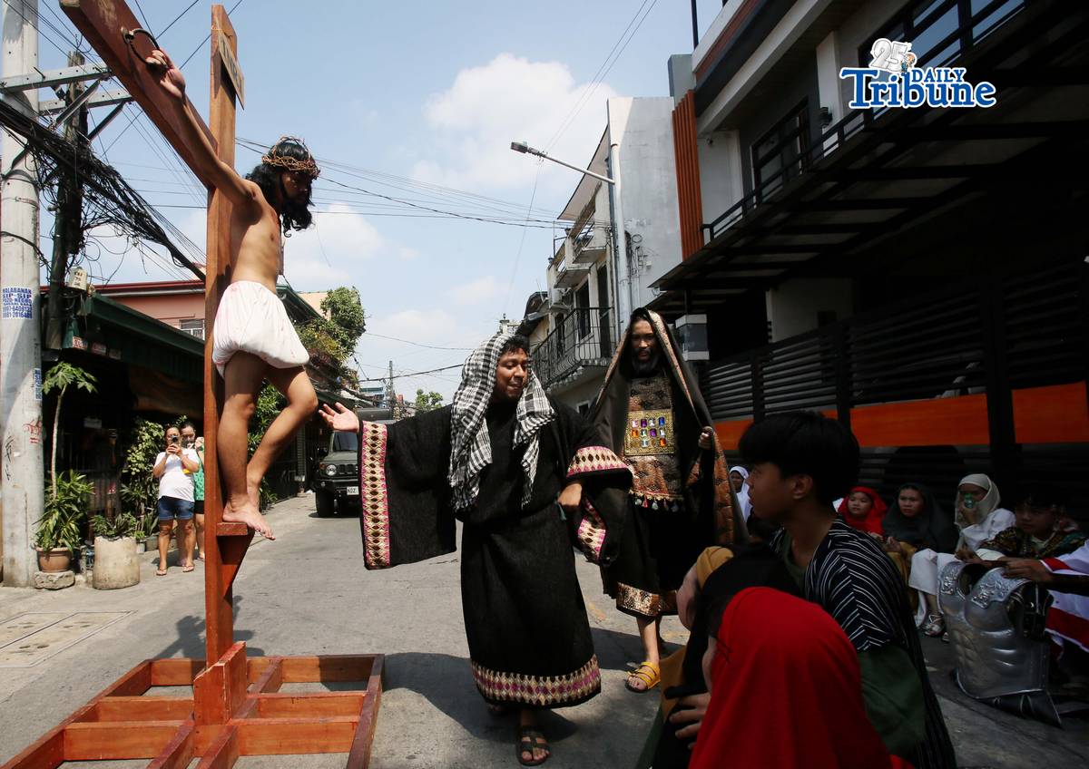 (March 28 2026) The Diocesan Shrine and Parish of Our Lady of Light, youth members take part in the Living Stations of the Cross in Barangay San Juan in Cainta on Saturday, March 28, 2026. The annual Lenten tradition, led by the parish youth ministry, brings the community together as they reenact Christ’s passion while moving through selected barangays. Cainta, Rizal, is recognized as the "Senakulo Capital of the Philippines" for its deep-rooted Holy Week tradition of performing theatrical re-enactments of the passion, death, and resurrection of Jesus Christ. Since 1904, the town has staged elaborate Passion plays involving multiple local groups. Photo/Analy Labor