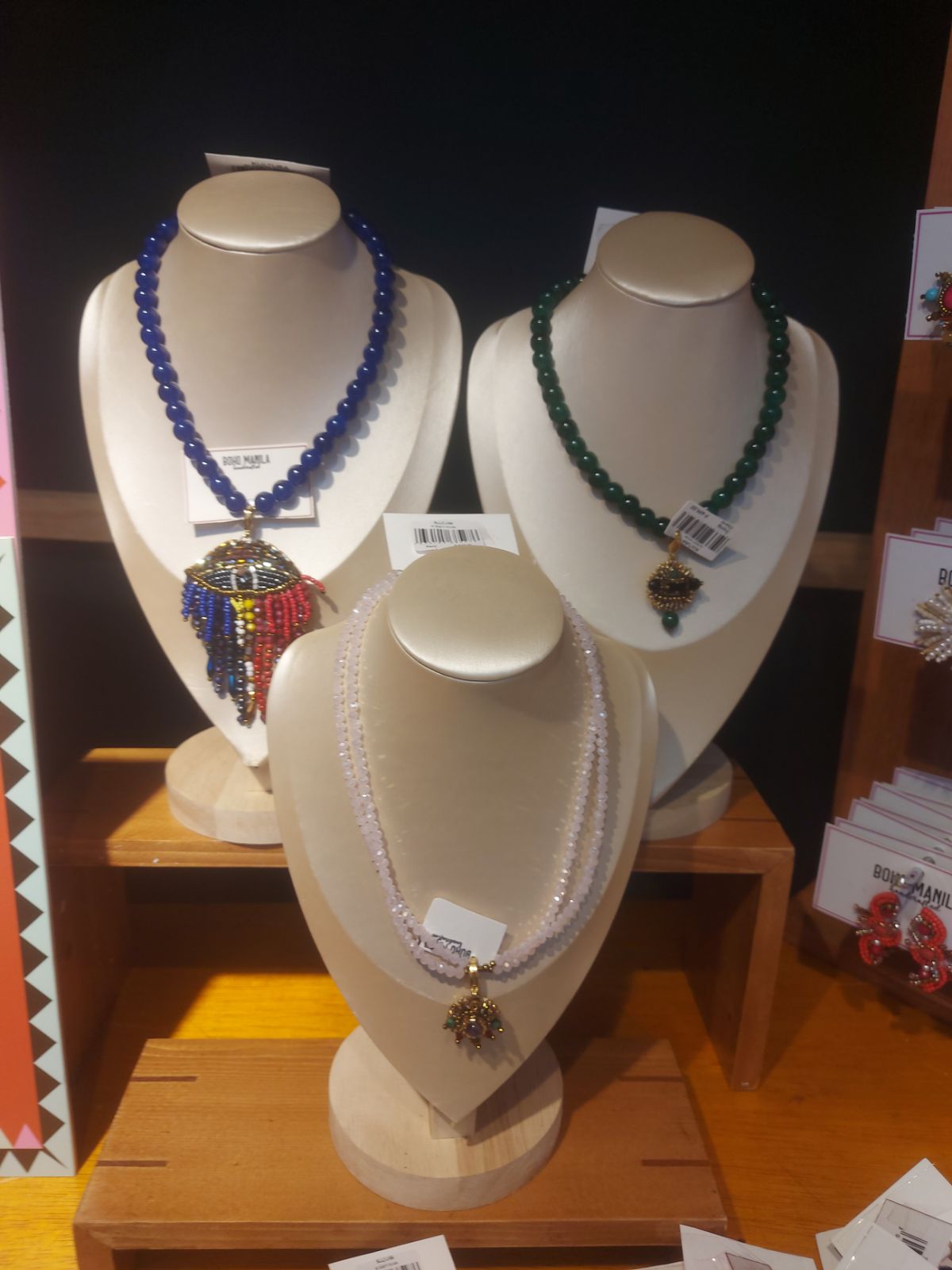 NECKLACES with intricate Filipino-inspired designs.