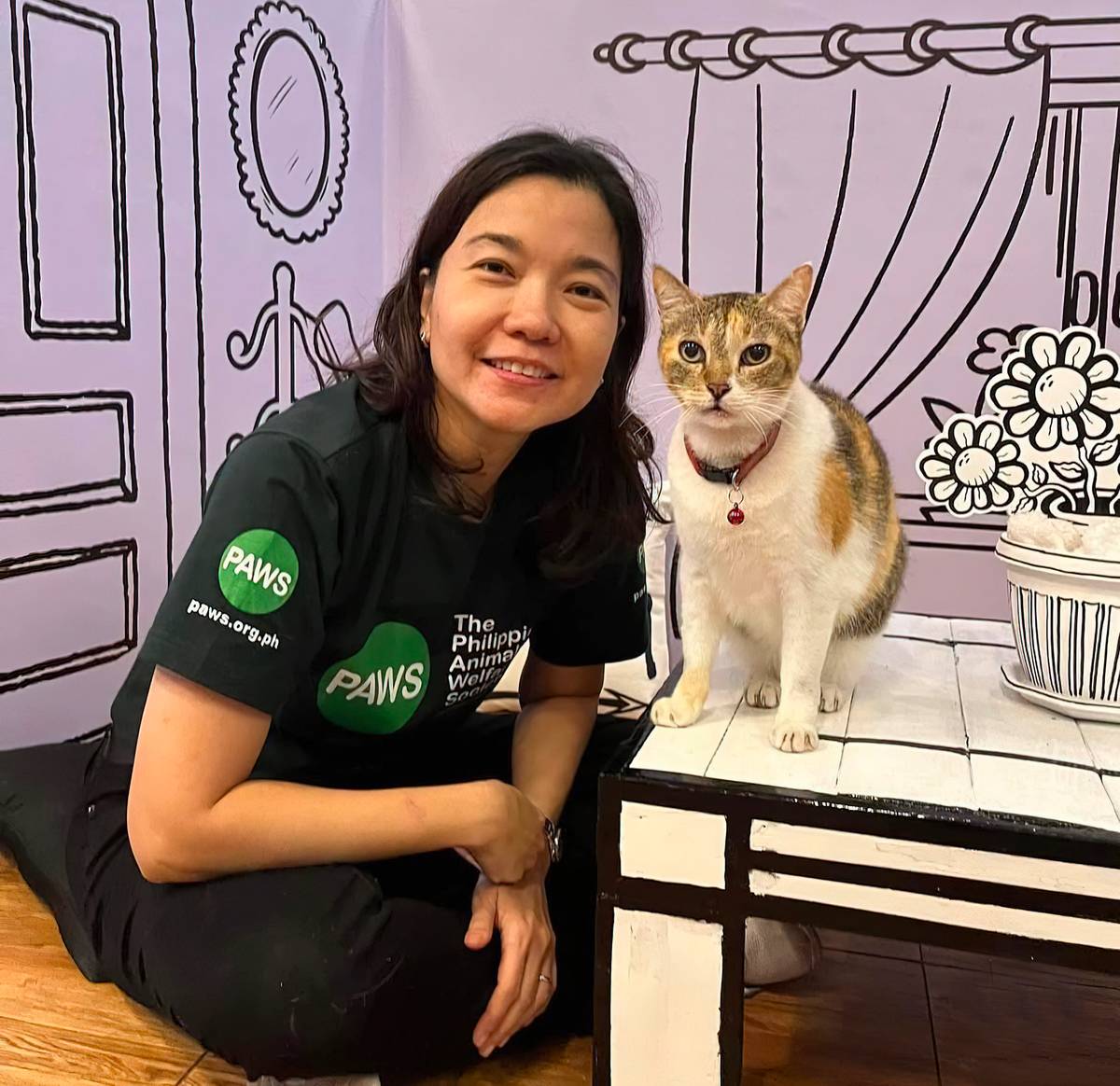 CAT got her heart. Anna with the late PAWS shelter CEO (cat executive officer) Fleur.