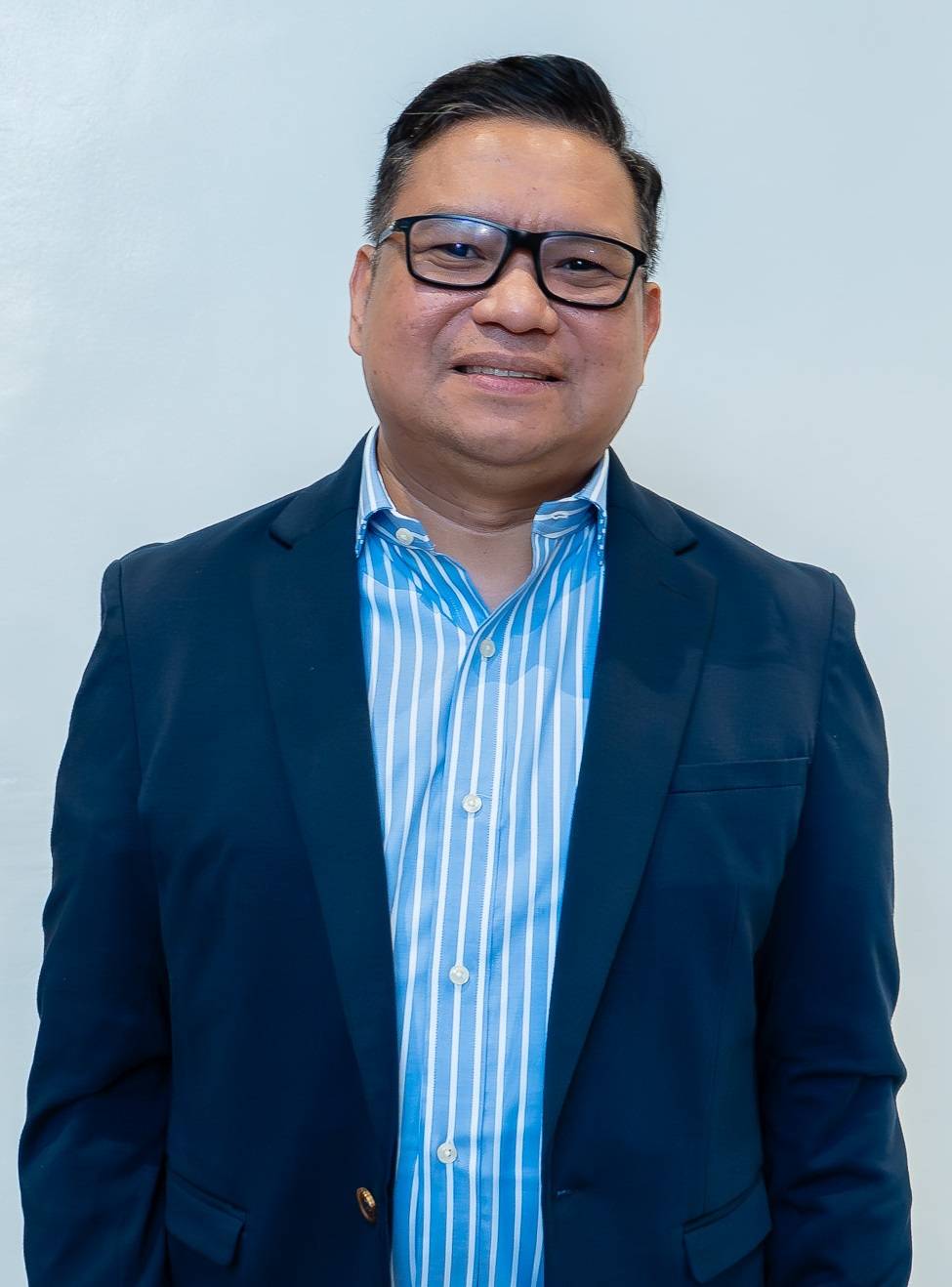 DIRECTOR Cris P. Tenorio