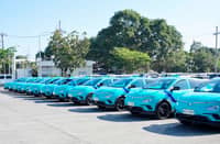 FLEET of Green Xentro electric taxis lines up as part of the 2,500-unit deployment.
