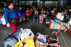 Travellers at the Northport Passenger Terminal