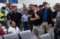 PPA general manager Atty. Jay Santiago converses with passengers in Batangas Port during his inspection on Monday.