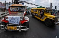 GEORGE Cahanding makes sure commuters do not mistake his jeepney for one of the public utility vehicles the government has paid to provide free rides amid the fuel crunch.