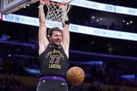 LUKA Doncic returns from a one-game suspension, dropping 42 points to power the Los Angeles Lakers to a 127-113 victory over the Cleveland Cavaliers in the NBA regular season.
