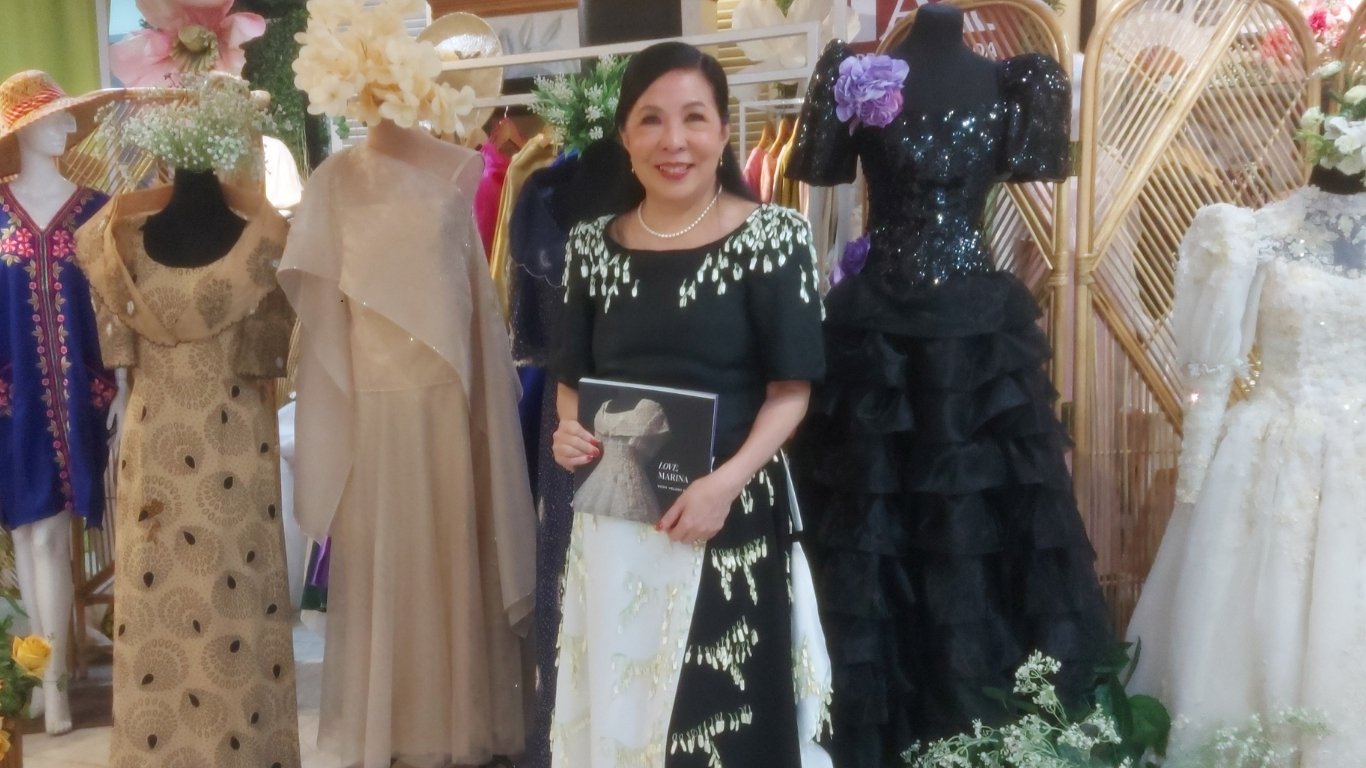 FASHION designer, author and culinary instructor Vicky Veloso Barrera holding her new book ‘Love, Marina.’