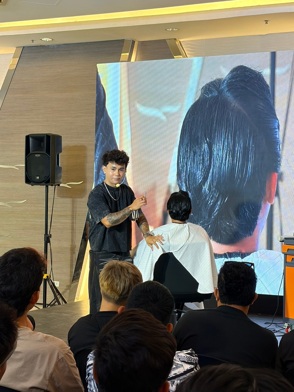 JC Barber, Tipuno X founding stylist, demonstrates the precision of the Vietnamese Fade.