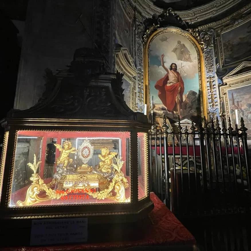 Remains of St. John The Baptist's head is encased in this vessel guarded by golden angels.
