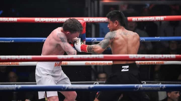 MARK ‘Magnifico’ Magsayo batters Irish Feargal McCrory en route to a fifth-round stoppage in their scheduled 10-round lightweight duel on Monday (Manila time) during ZUFFA Boxing’s show at the Meta APEX in Las Vegas.