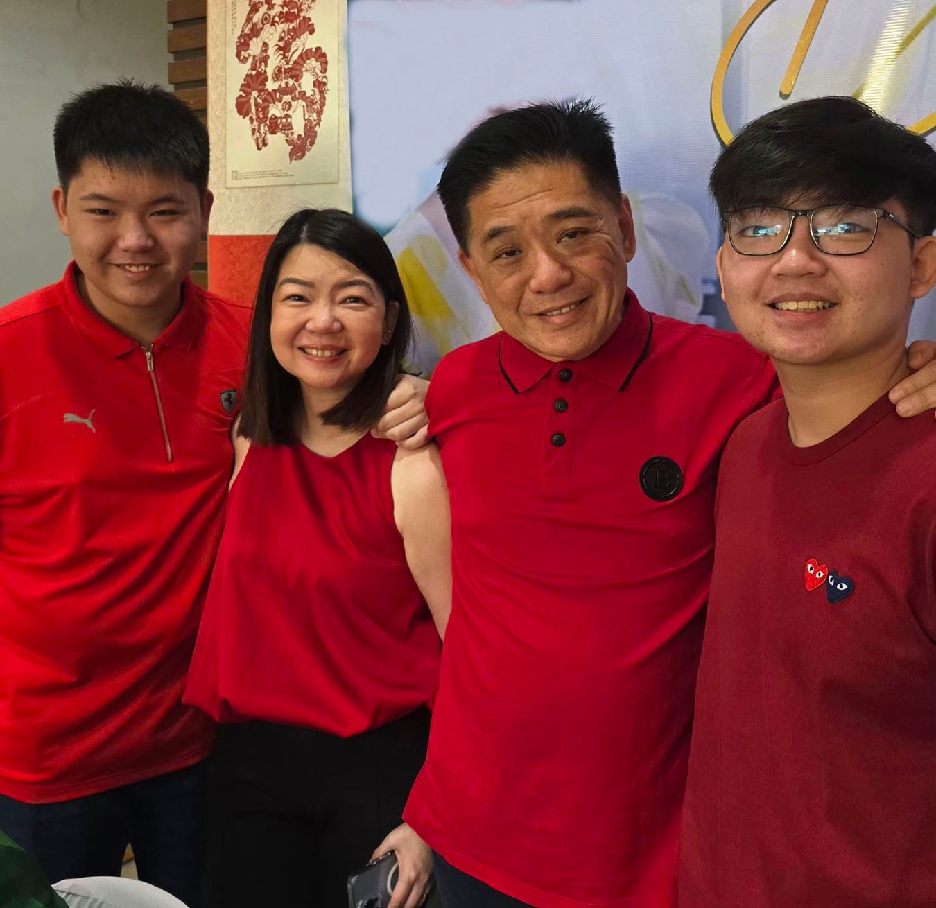 CATHY and Mitch Uy with twins Koji and Kenji.