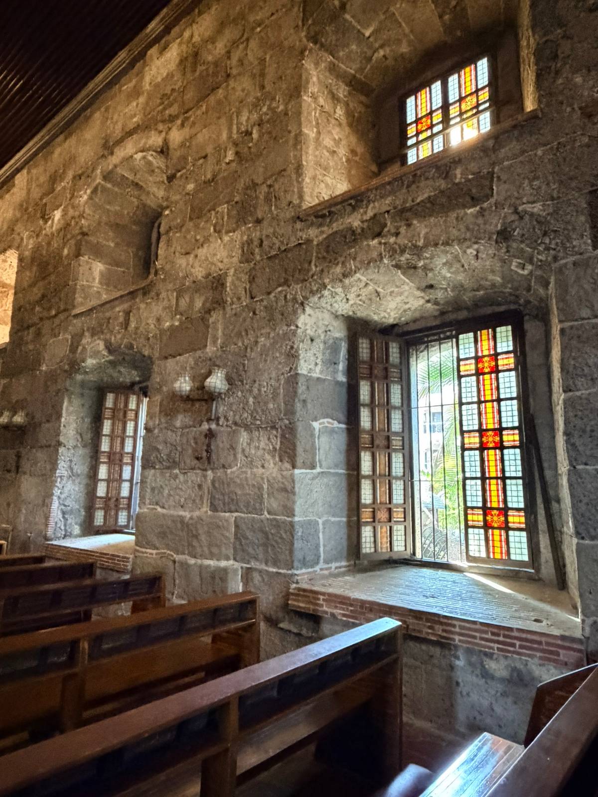 EARTHQUAKE Baroque adobe walls meet stained glass windows, blending strength and light in a timeless sacred space.