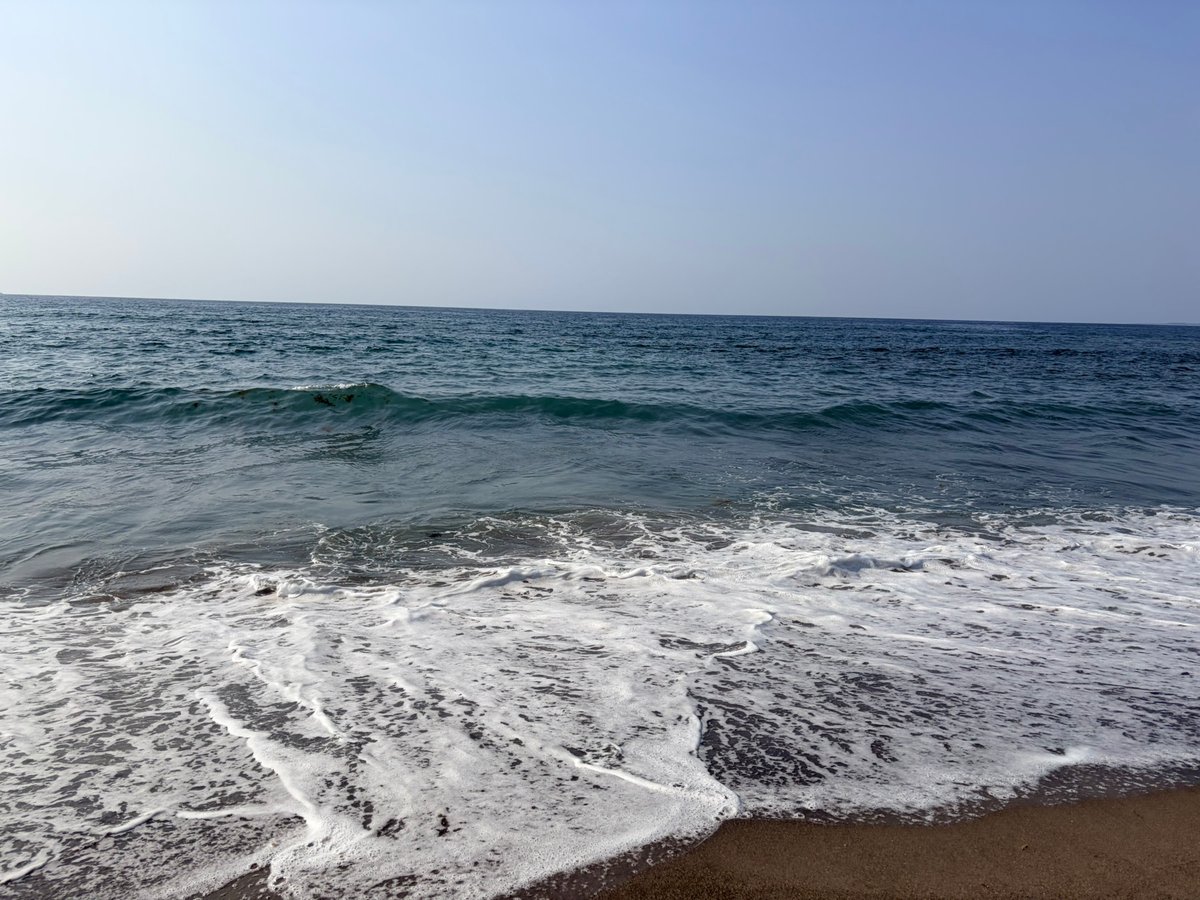 BLACK sand shores set the stage for La Union’s surf, where dark grains meet rolling waves in a rhythm both raw and inviting.