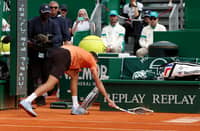 DANIIL Medvedev smashes his racket after suffering a 0-6, 0-6 loss to Matteo Berrettini in the second round of the Monte Carlo Masters on Thursday.