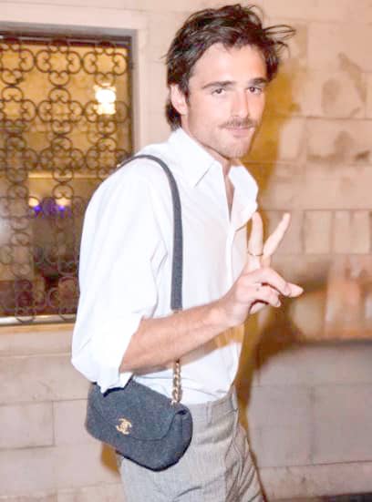 JACOB Elordi carrying a Chanel bag.