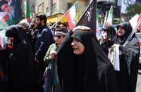 Slain Khamenei supporters hold tribute rally