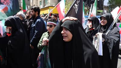 Slain Khamenei supporters hold tribute rally