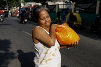 Manileños avail P20 rice