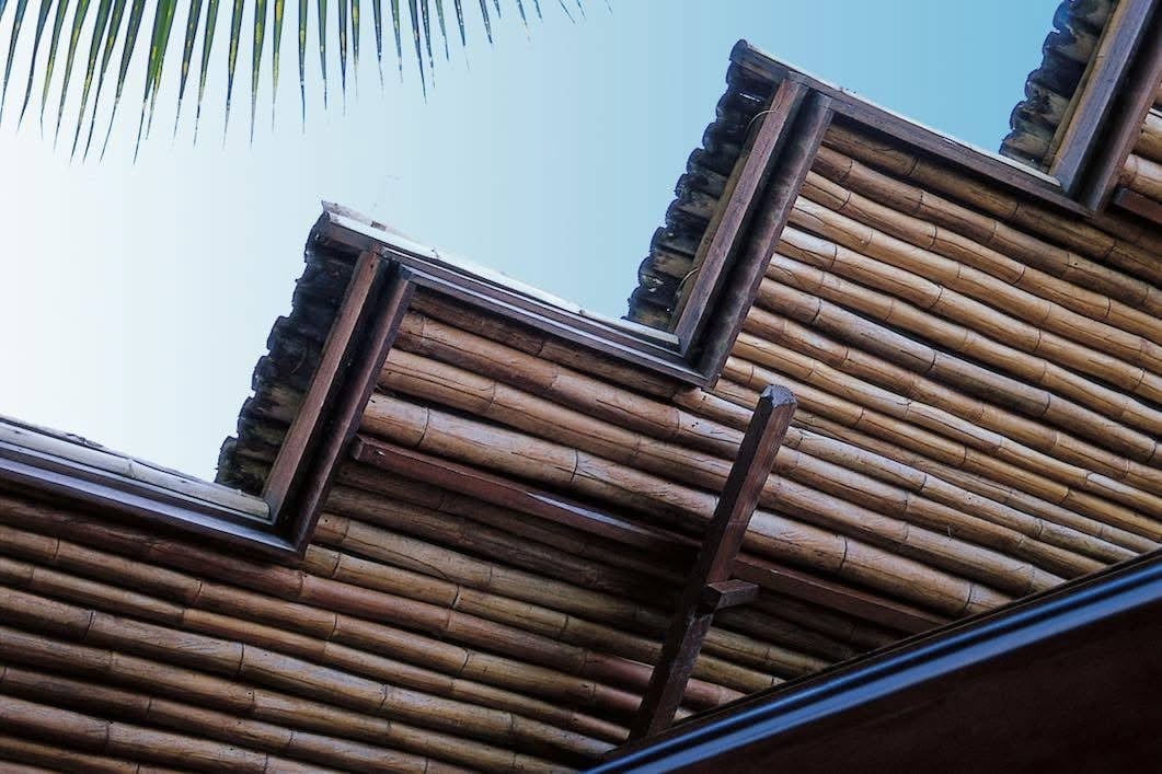 MATERIAL choice is crucial, as bamboo, nipa, and wood absorb less heat than concrete, helping keep interiors cooler throughout the day.