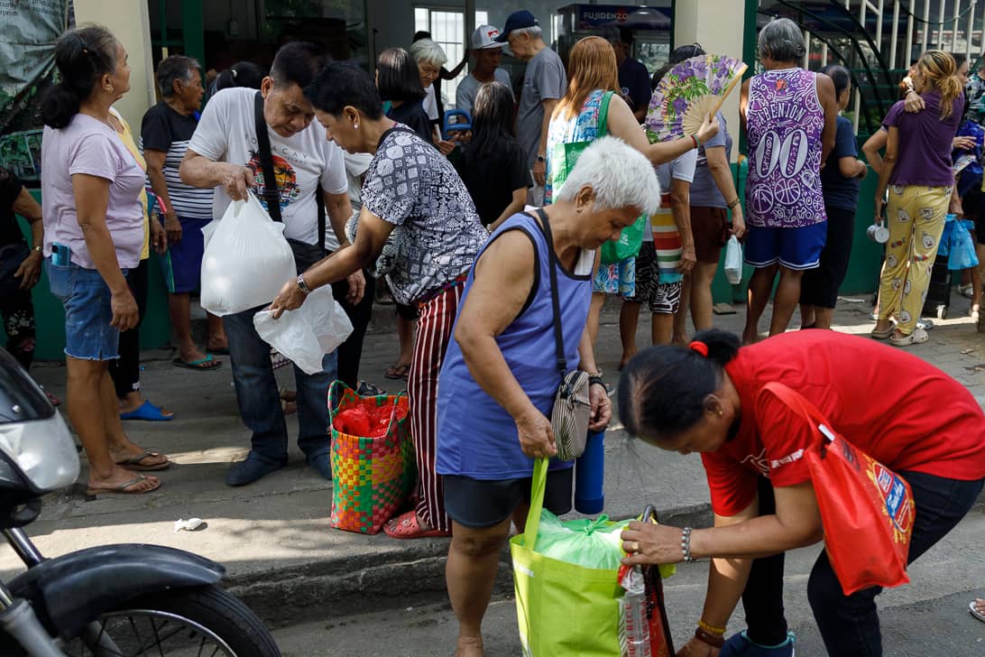 People line up to buy rice priced at P20 per kilo and other farm products at the Kadiwa ng Pangulo Center in Malate, Manila on Friday, 10 April 2026.

Residents said they queued as early as 4 a.m., with some sleeping outside overnight to secure a spot and avail of the subsidized rice under the Bente Bigas program.