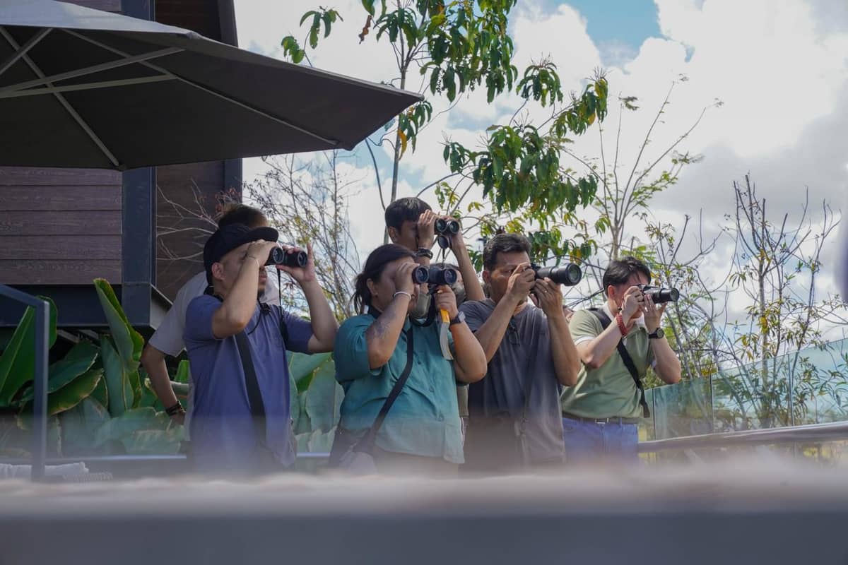 RESIDENTS and bird enthusiasts take part in a morning bird watching session, spotting species uncommon in typical Metro Manila neighborhoods.