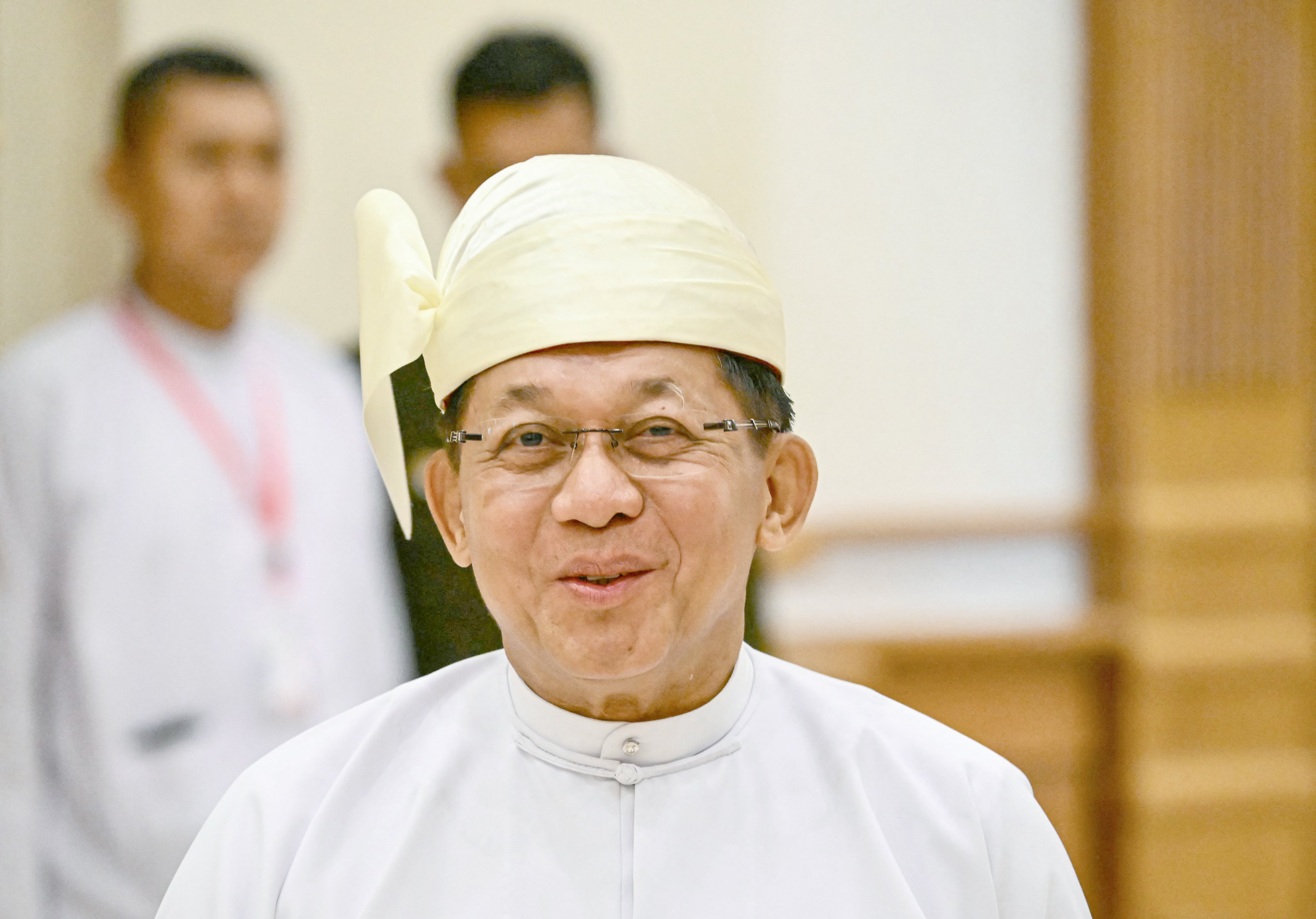 Junta chief swears as president