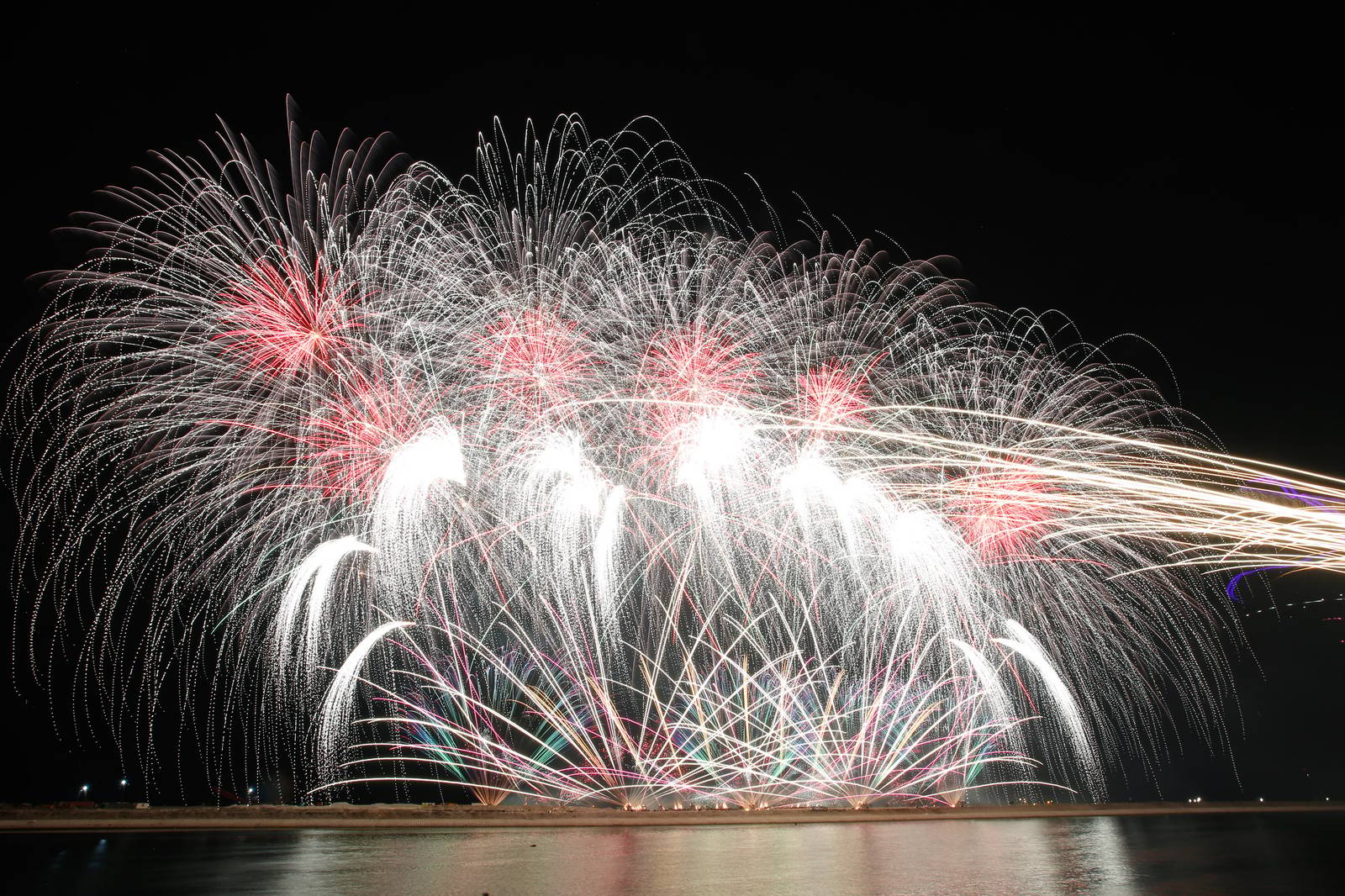 Philippines' Platinum Fireworks Incorporated lights up the Manila Bay skies during the finale exhibition of the 13th Philippine International Pyromusical Competition at the SM Mall of Asia in Pasay City on 11 April 2026. Pyrotex Fireworx from the United Kingdom took this year's championship title, besting seven other competing countries.